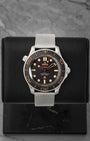 Front portrait view of a pre-owned Omega Seamaster Diver 300M No Time To Die 007 Edition titanium watch on a mesh bracelet, available at Noahs Fine Watches and Jewelry Dallas