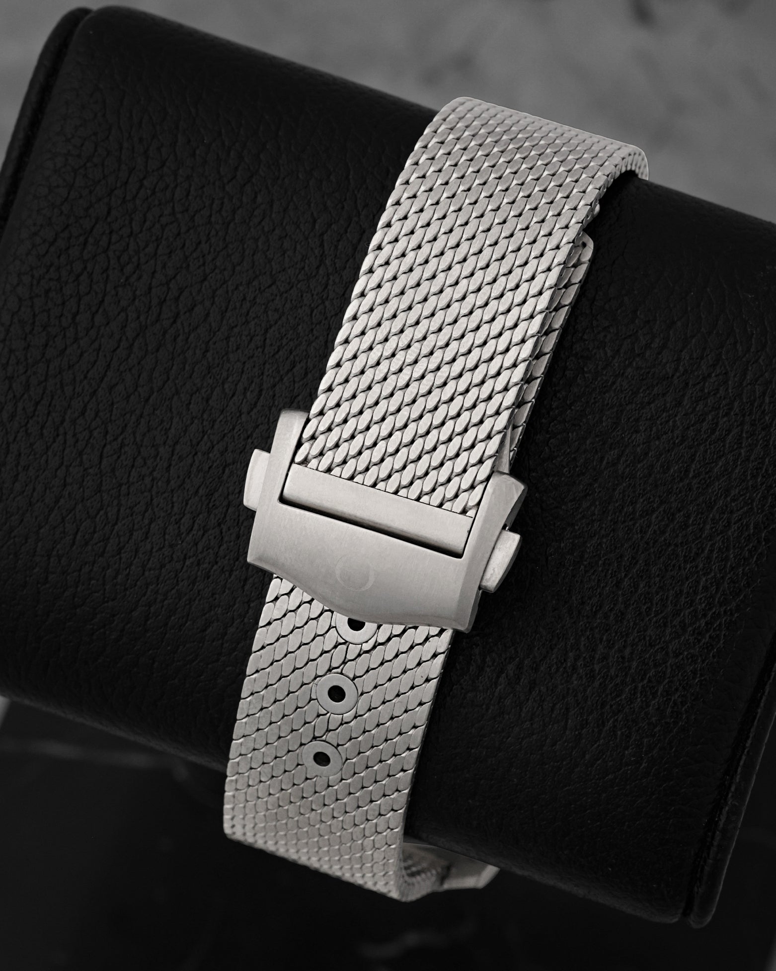 Rear view of the innovative Grade 2 titanium mesh Milanese bracelet secured by an adjustable folding deployant clasp