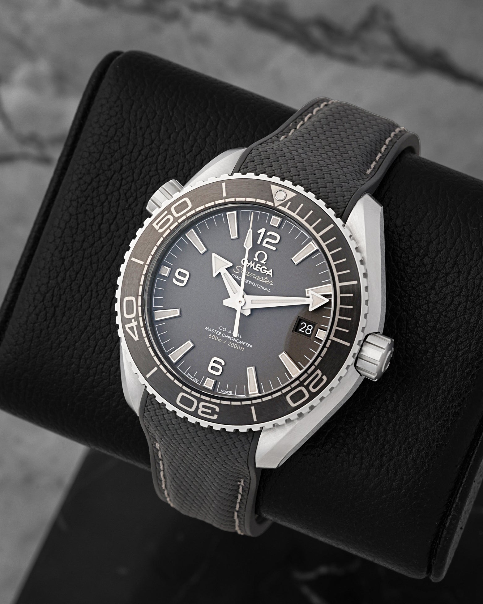 Angled view of Omega Seamaster Planet Ocean 600M with gunmetal grey dial and black ceramic bezel
