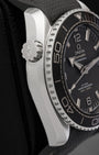 Side view of the 11 o'clock helium escape valve on an Omega Seamaster Planet Ocean 600M steel case