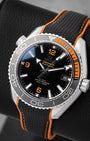 Angled view of Omega Seamaster Planet Ocean 600M black dial with orange Arabic numerals and bezel