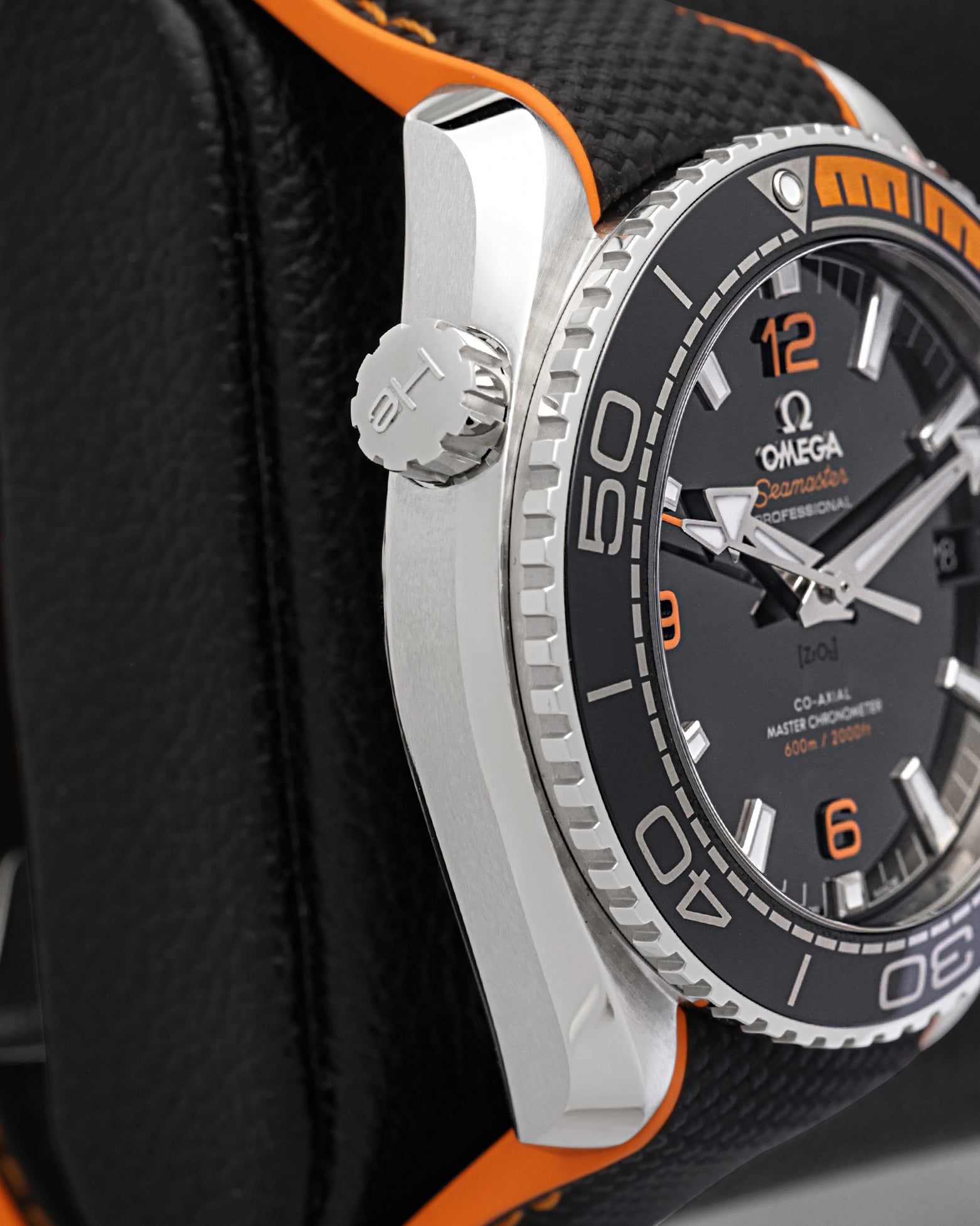 Side profile showing the 10 o'clock helium escape valve on an Omega Seamaster Planet Ocean 600M steel case