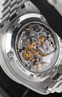 Sapphire display case back showing the manual-wind Co-Axial Master Chronometer Calibre 3861 movement on Omega Speedmaster Sapphire Sandwich