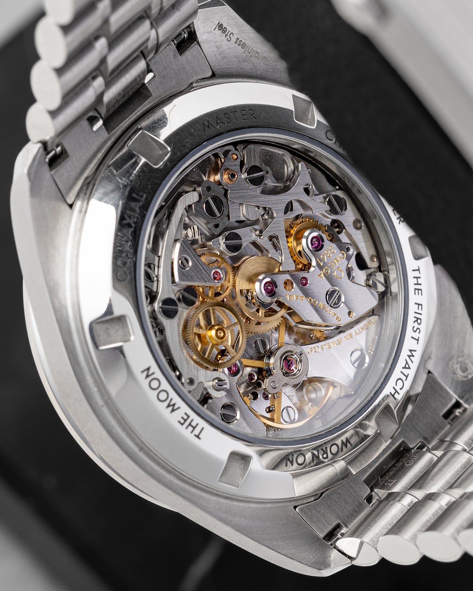 Sapphire display case back showing the manual-wind Co-Axial Master Chronometer Calibre 3861 movement on Omega Speedmaster Sapphire Sandwich