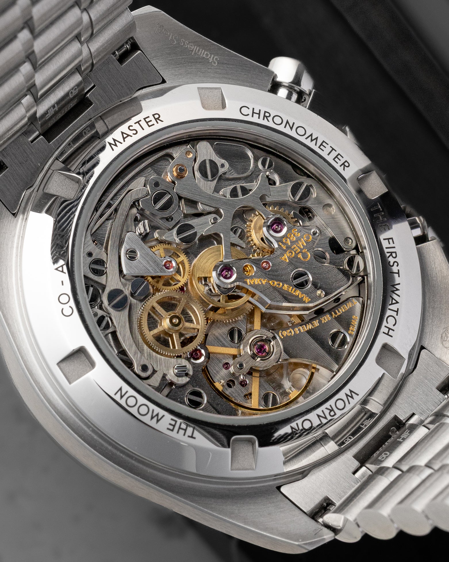 Sapphire display case back showing the manual-wind Co-Axial Master Chronometer Calibre 3861 movement on Omega Speedmaster Reverse Panda
