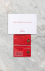Original red Omega international warranty cards and Essential Guide booklet included with Speedmaster Reverse Panda 310.30.42.50.01.004