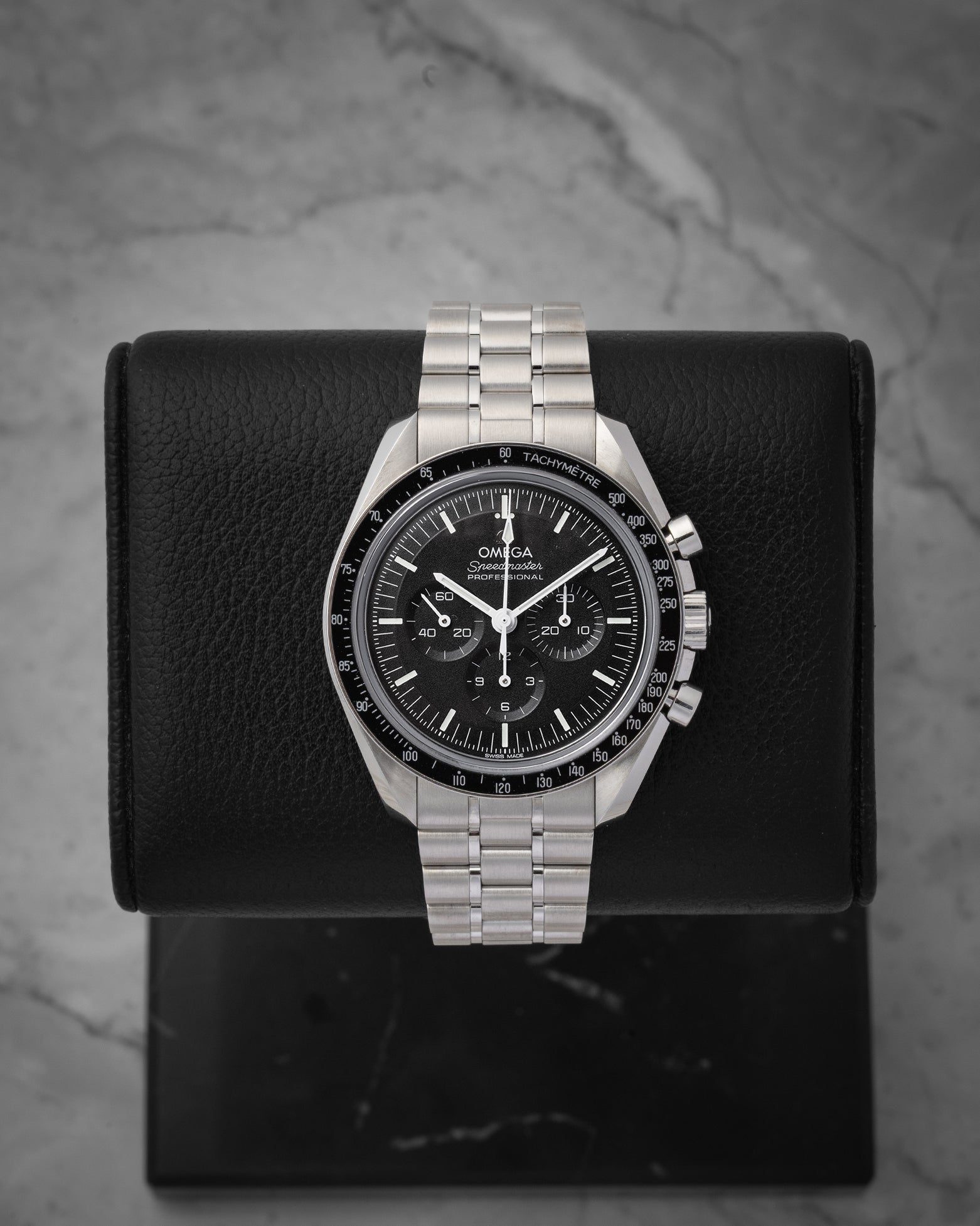 Pre-owned 2021 Omega Speedmaster Moonwatch Professional Sapphire Sandwich reference 310.30.42.50.01.002 with black step dial at Noah's Fine Watches & Jewelry in Dallas, Texas