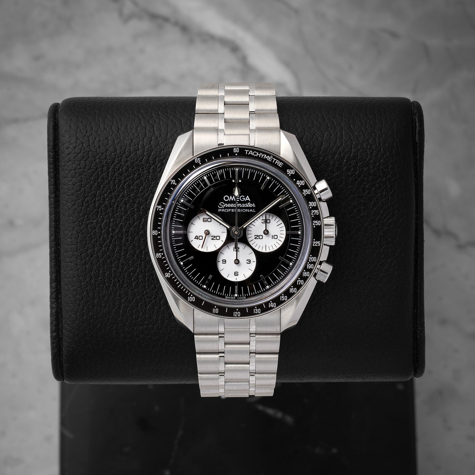 Preowned 2026 Omega Speedmaster Moonwatch Professional Reverse Panda reference 310.30.42.50.01.004 with white subdials at Noah's Fine Watches & Jewelry in Dallas, Texas