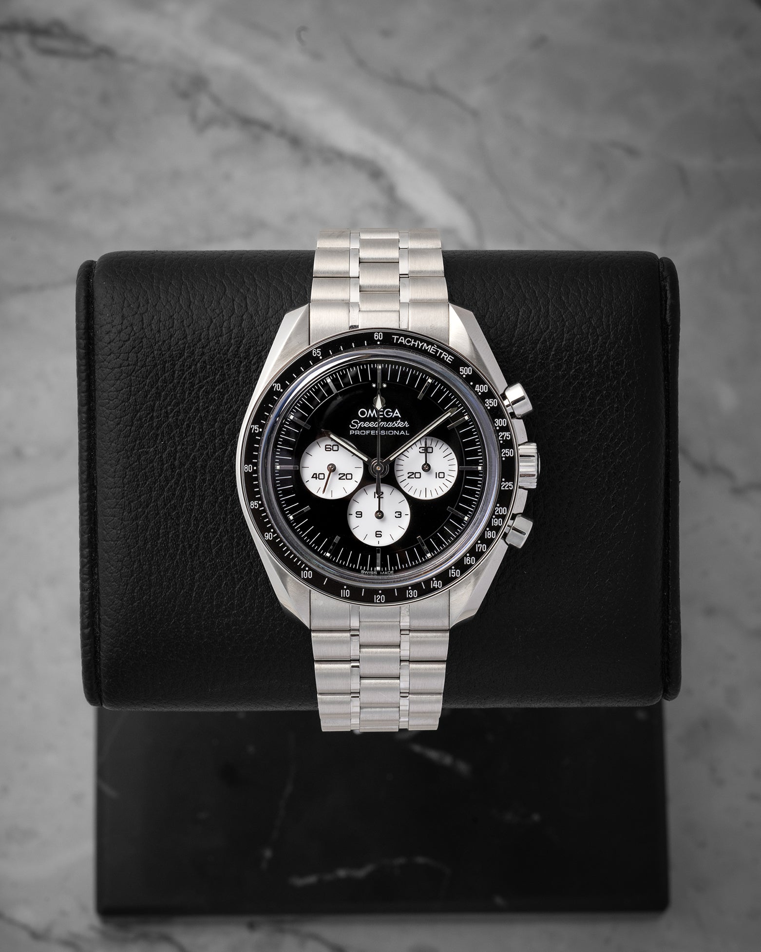 Preowned 2026 Omega Speedmaster Moonwatch Professional Reverse Panda reference 310.30.42.50.01.004 with white subdials at Noah's Fine Watches & Jewelry in Dallas, Texas