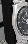 Side profile showing the 42mm asymmetrical stainless steel case and Hesalite crystal profile