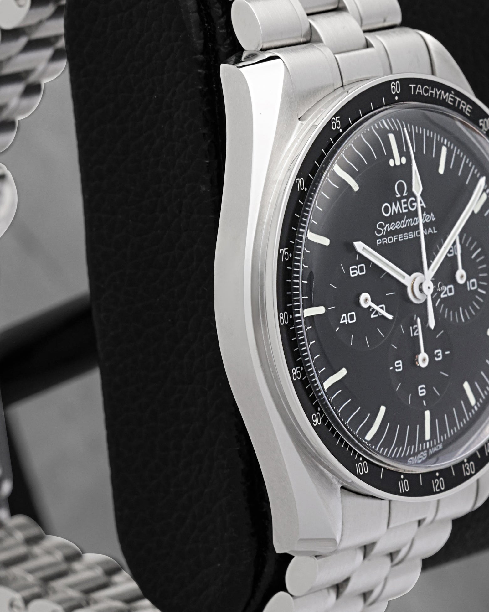 Side profile showing the 42mm asymmetrical stainless steel case and Hesalite crystal profile