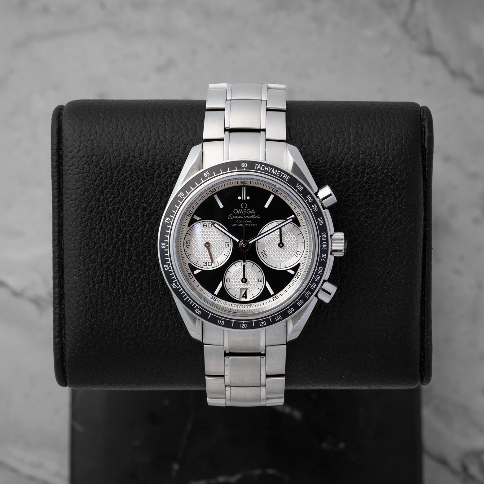 Preowned Omega Speedmaster Racing Chronograph 326.30.40.50.01.002 40mm reverse panda dial watch at Noah's Fine Watches Dallas
