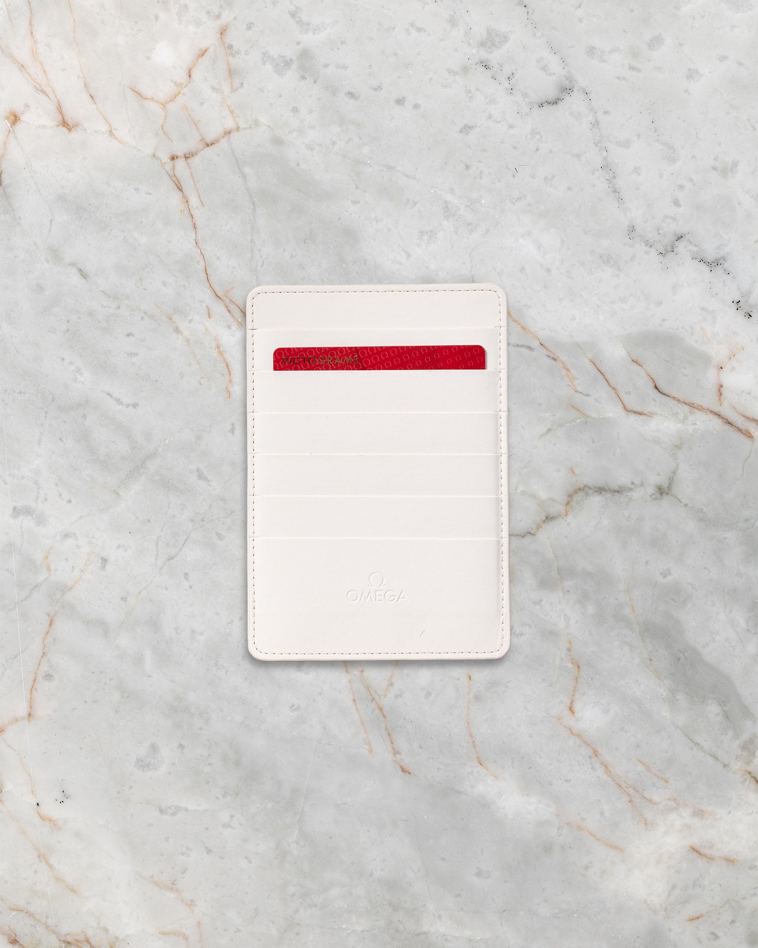 Official Omega pictogram warranty cards and white leatherette cardholder for Speedmaster Racing 326.30.40.50.01.002
