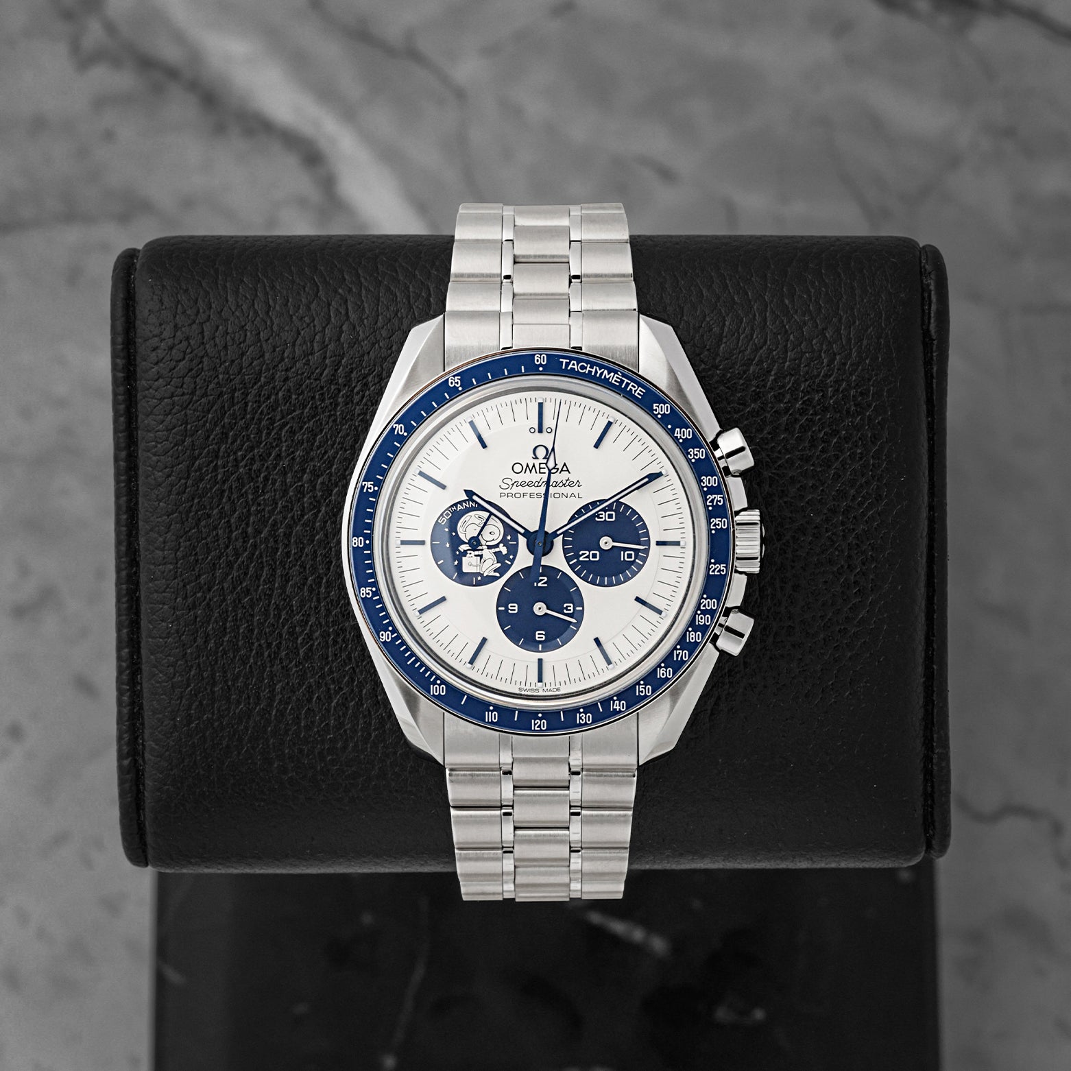 Pre owned Omega Speedmaster Silver Snoopy Award 50th Anniversary 310.32.42.50.02.001 at Noah's Fine Watches & Jewelry in Dallas, TX