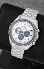 front view of Omega Speedmaster Silver Snoopy Award showing blue sub-dials, blue ceramic bezel, and steel bracelet