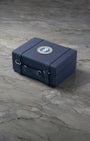 Signature blue 50th Anniversary presentation box for Omega Speedmaster Silver Snoopy Award at Noah's Fine Watches & Jewelry