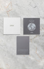 Original Oris instruction manuals and Clean Ocean Limited Edition certificate documentation accompanying the pre-owned 2022 model.