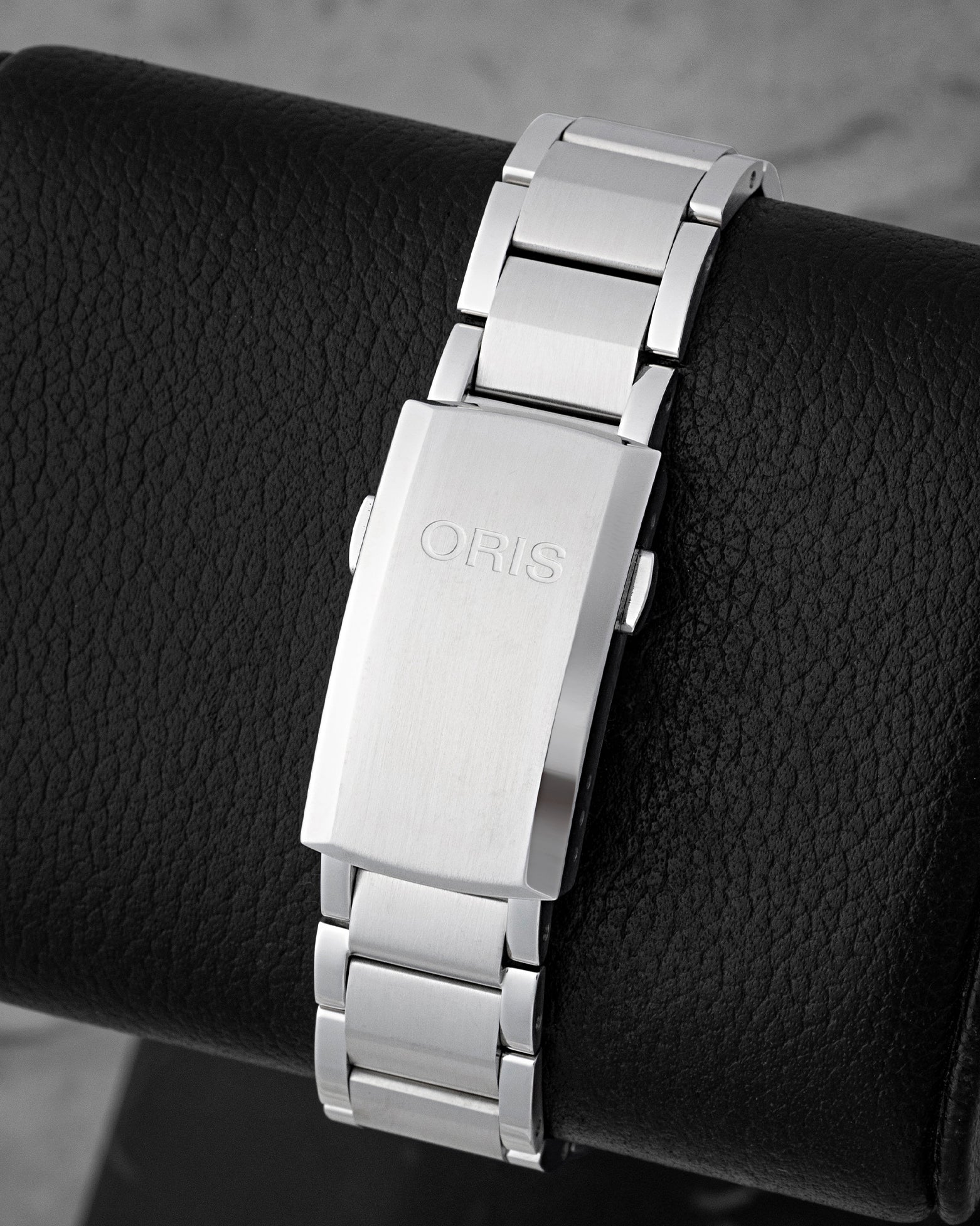 Multi-piece stainless steel bracelet with security folding clasp and extension for Oris Aquis Date
