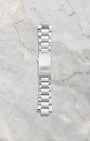 Included extra OEM multi-piece three-link stainless steel metal bracelet featuring the Oris quick-change strap extension mechanism