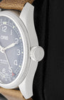 Close-up side view of the signature oversized screw-in crown and fluted coin-edge bezel on Oris Big Crown Pointer Date 4065