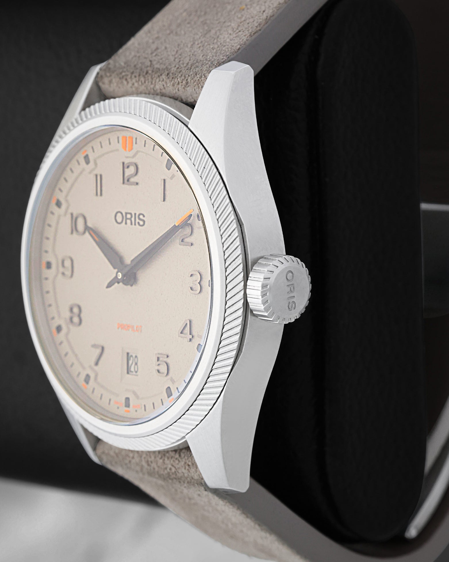 Right side profile view highlighting the oversized winding crown and turbine-inspired knurled bezel edge on an Oris ProPilot