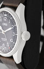 Close-up view of the oversized screw-in crown and fluted bezel on an Oris Big Crown Pointer Date Waldenburgerbahn watch
