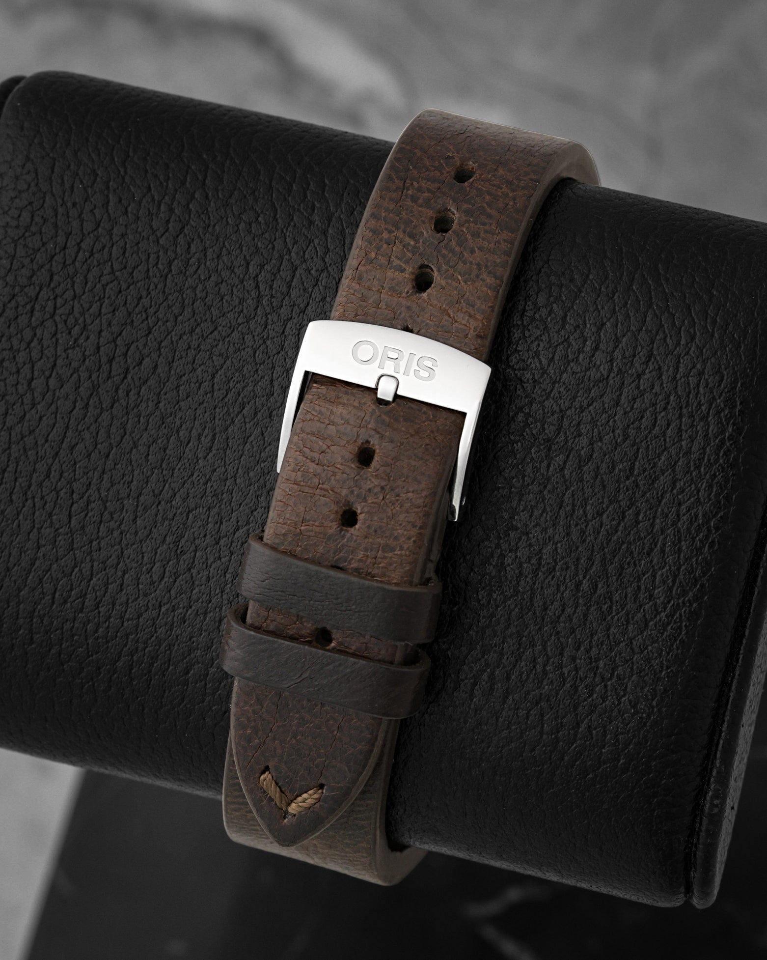 Dark brown Cervo Volante sustainable deer leather strap and steel pin buckle on Oris Big Crown Waldenburgerbahn