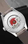 Open sapphire crystal exhibition caseback displaying the Oris Calibre 733 automatic movement and signature Oris Red Rotor