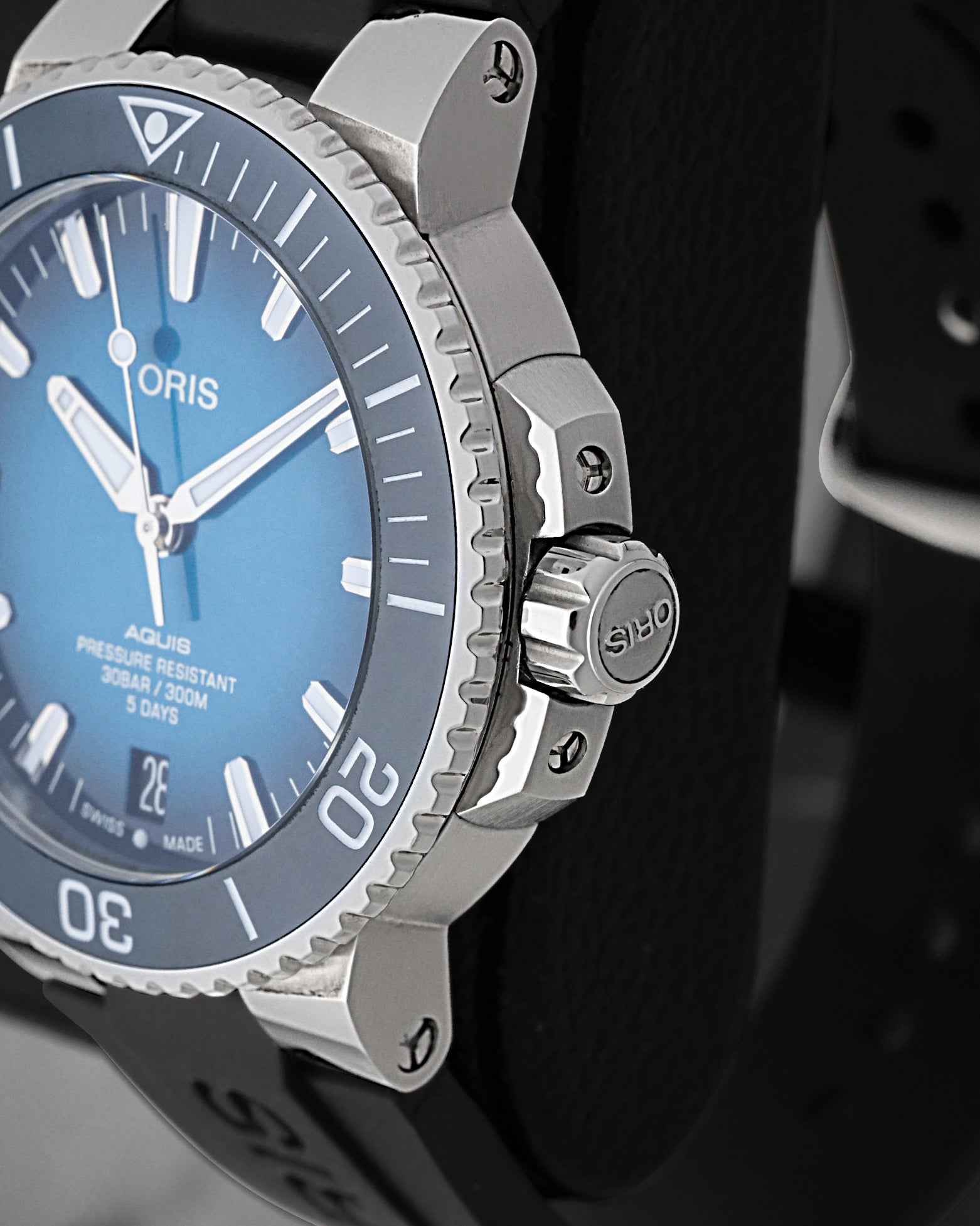 Side profile focus on the multi-piece stainless steel case design, screw-down security winding crown, and heavy-duty crown guards