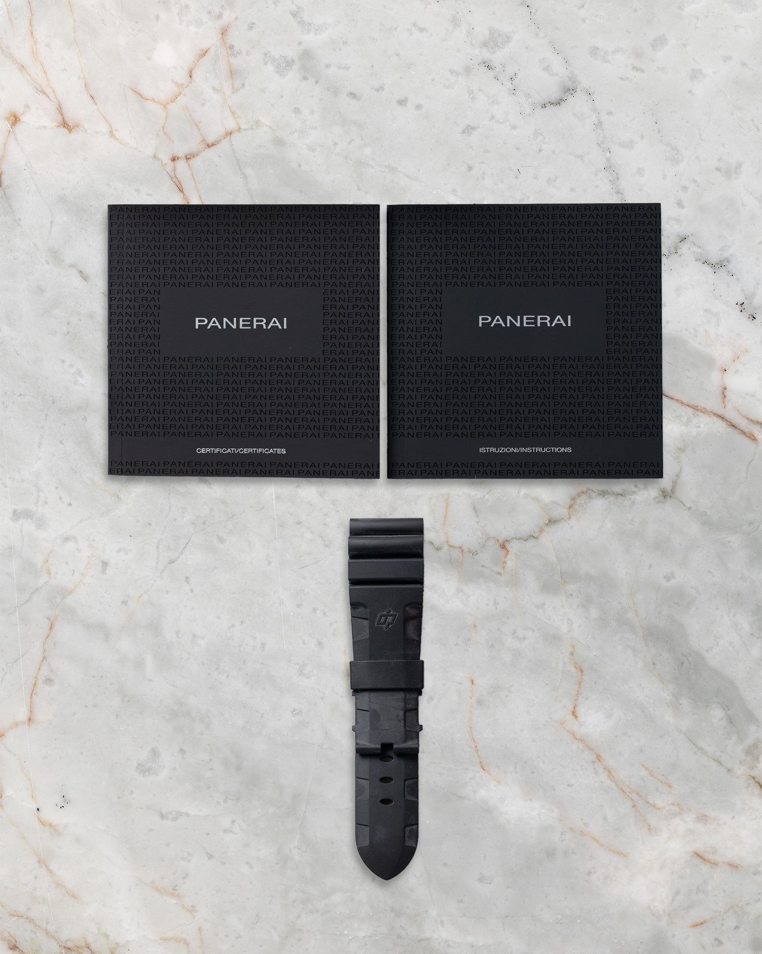 Official Panerai instruction booklets and additional black rubber strap included with pre-owned Regatta PAM00526