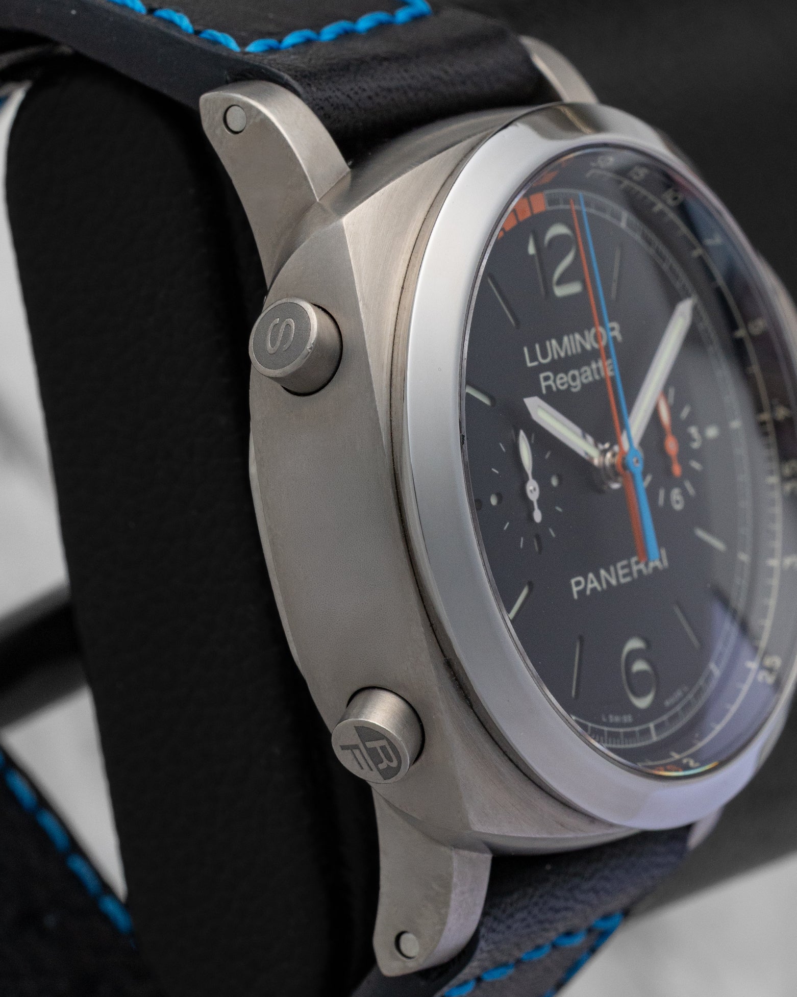 Side profile showing titanium chronograph start and flyback pushers at 8 and 10 o'clock on Panerai Luminor PAM00526
