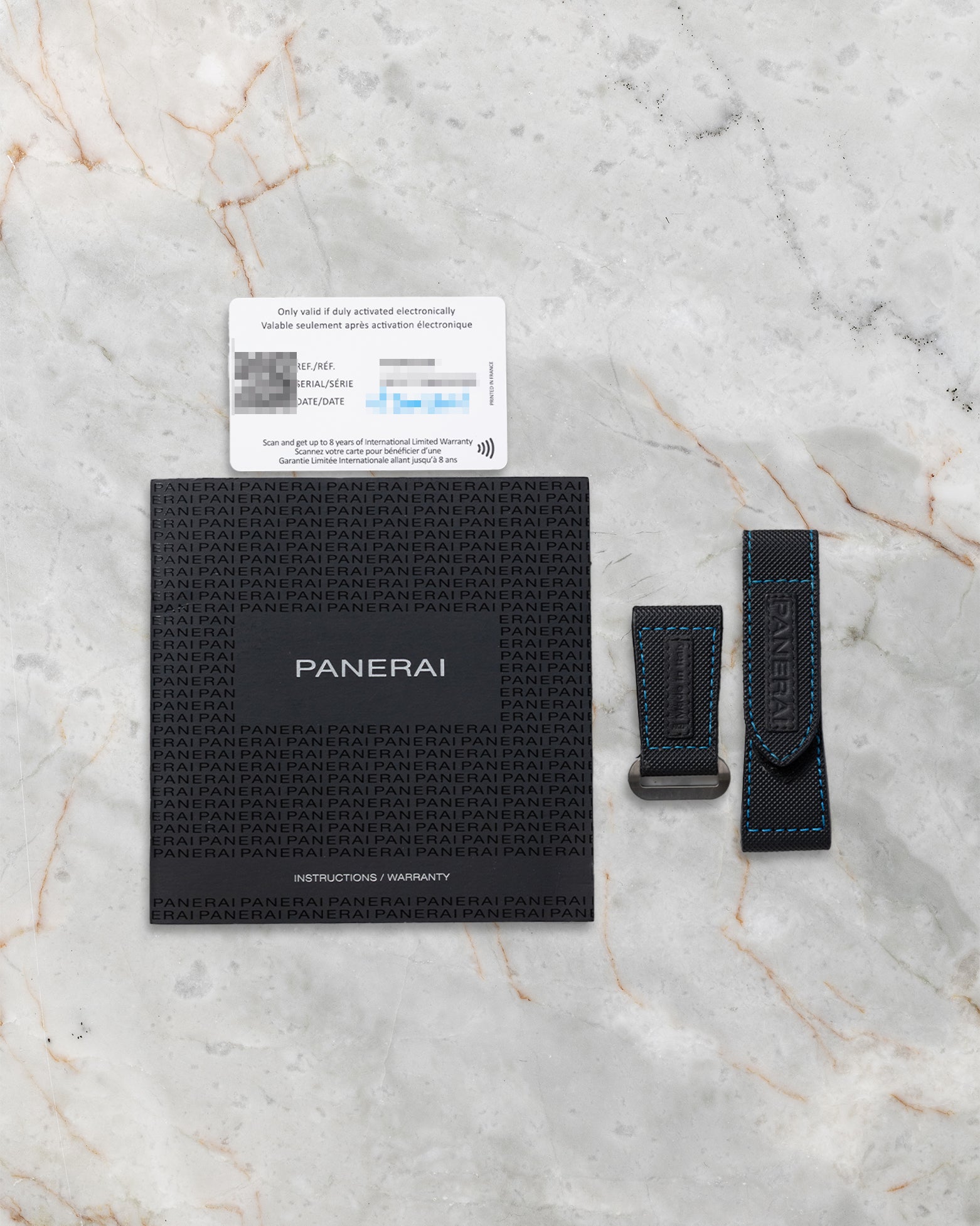 Panerai 2021 international guarantee card, instruction booklet, and extra black fabric strap for Submersible PAM00799