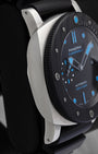 Side case profile showing the metallic glass sheen and Carbotech bezel edge on pre-owned Panerai Submersible 47mm