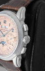 Close-up side profile of the Patek Philippe Grand Complications 5270P highlighting the polished platinum crown, rectangular chronograph pushers, and correction buttons
