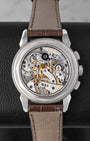 The interchangeable sapphire crystal caseback revealing the intricate manual-winding Caliber CH 29-535 PS Q perpetual calendar chronograph movement