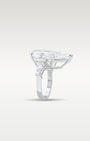 Side profile showing the low basket setting and platinum band structure of a pear-cut diamond ring with tapered baguettes