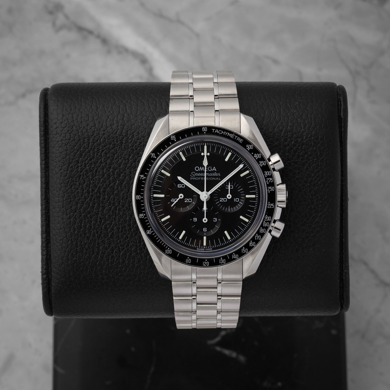 A preowned 2025 Omega Speedmaster Professional Moonwatch reference 310.30.42.50.01.002 featuring a matte black step dial, tri-compax chronograph layout, and sapphire crystal at Noah's Fine Watches & Jewelry in Dallas
