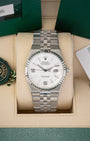 A preowned 2025 Rolex Land-Dweller 36 reference 127234 in White Rolesor steel featuring an intense white honeycomb motif dial, fluted bezel, and integrated Flat Jubilee bracelet inside its box at Noah's Fine Watches & Jewelry in Dallas