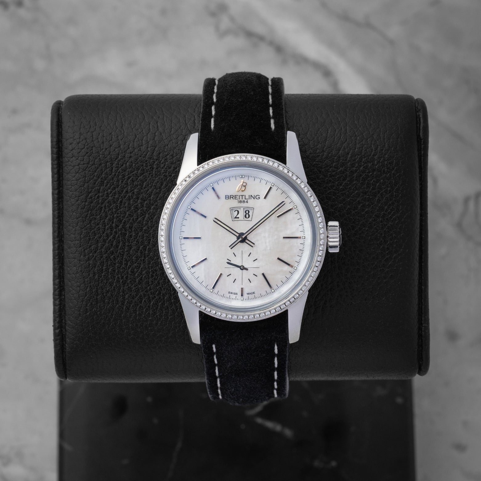 Pre owned Breitling Transocean 38 A1631053 stainless steel luxury watch featuring a mercury silver dial, twin-aperture big date window, and beaded bezel at Noah's Fine Watches and Jewelry in Dallas