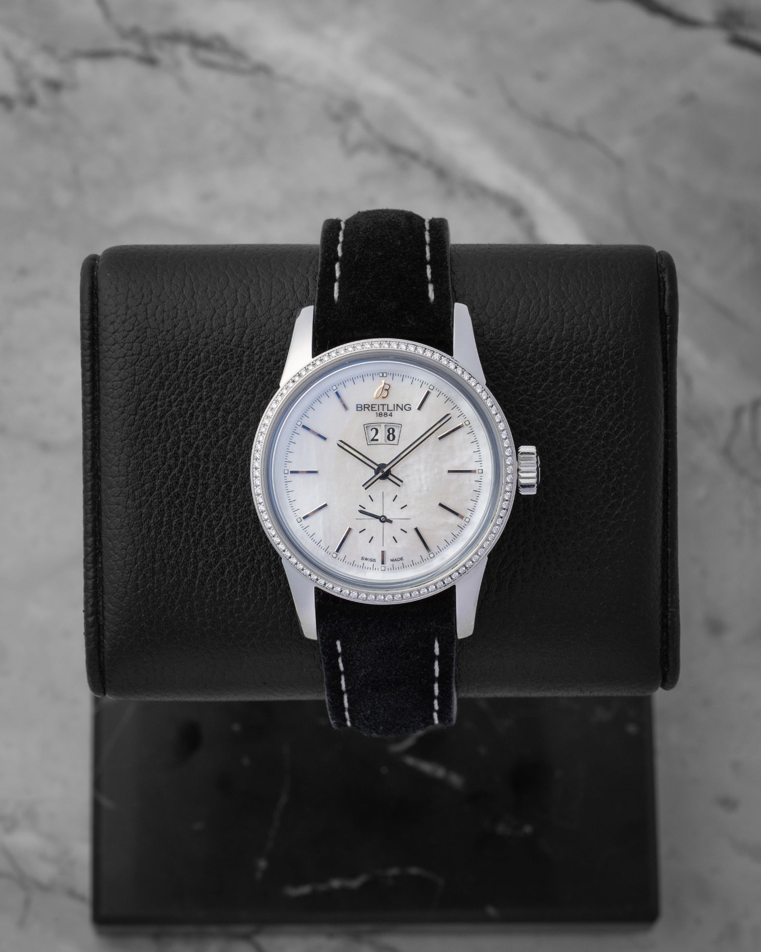 Pre owned Breitling Transocean 38 A1631053 stainless steel luxury watch featuring a mercury silver dial, twin-aperture big date window, and beaded bezel at Noah's Fine Watches and Jewelry in Dallas