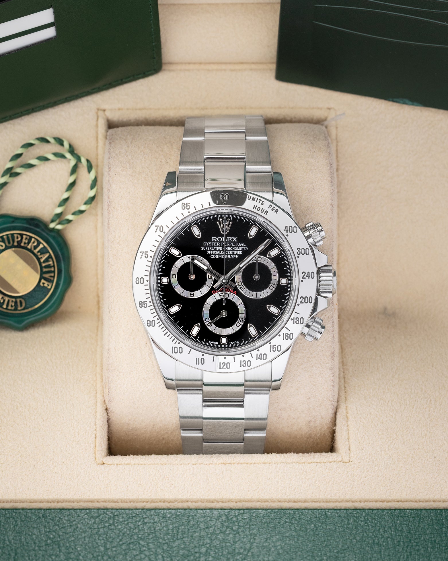 Preowned Rolex Cosmograph Daytona 116520 stainless steel watch with black dial and steel tachymeter bezel at Noah's Fine Watches and Jewelry Dallas Texas