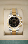 Preowned Rolex Cosmograph Daytona 116523 two-tone steel and 18k yellow gold watch with black racing dial at Noah's Fine Watches and Jewelry Dallas Texas
