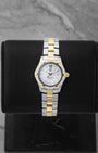 Preowned TAG Heuer Aquaracer 27mm WAF1450 ladies two-tone steel and yellow gold watch with factory diamond bezel and white Mother of Pearl dial at Noah's Fine Watches and Jewelry Dallas Texas