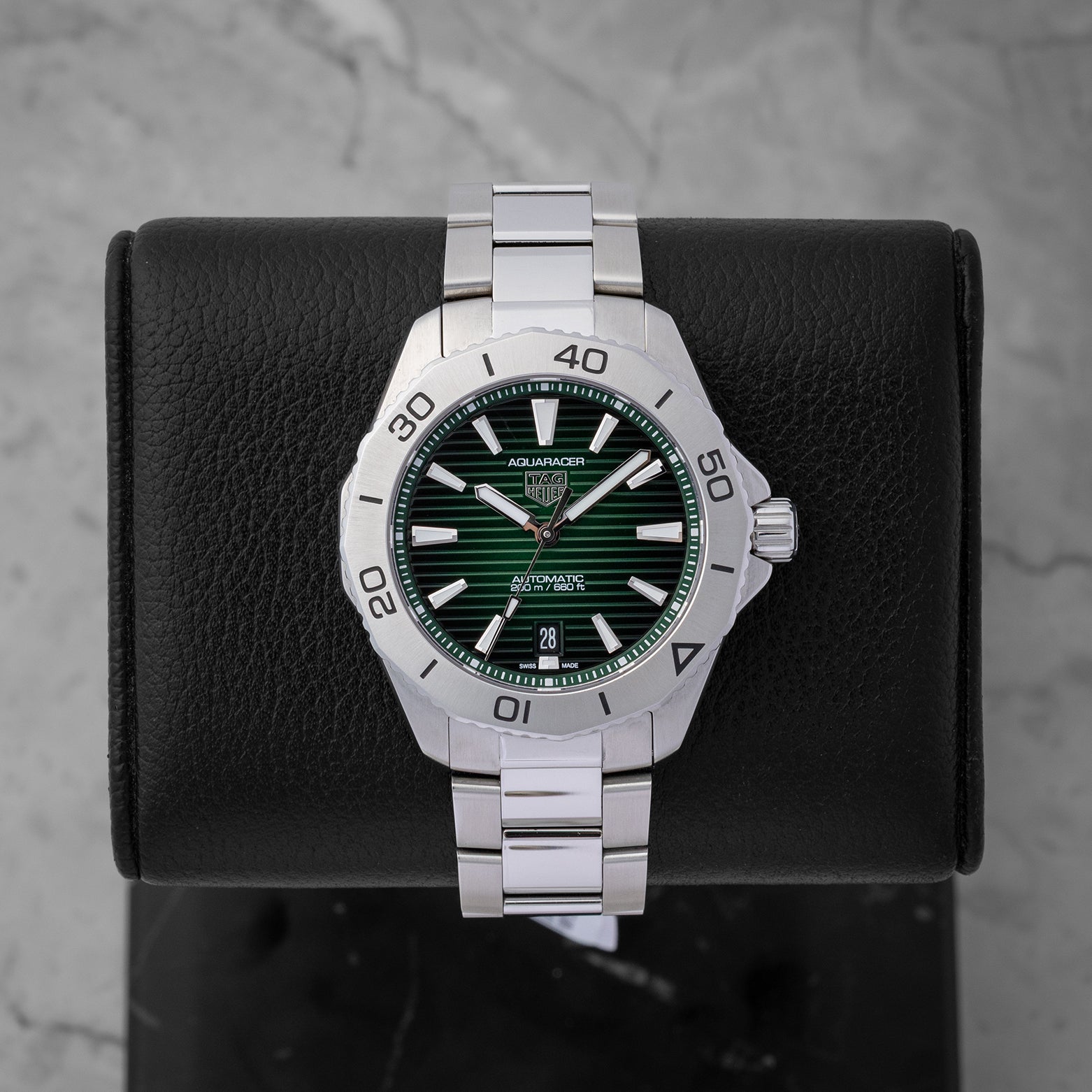 Preowned TAG Heuer Aquaracer Professional 200 Date WBP2115.BA0627 luxury watch featuring a textured horizontal liner green dial at Noah's Fine Watches and Jewelry in Dallas