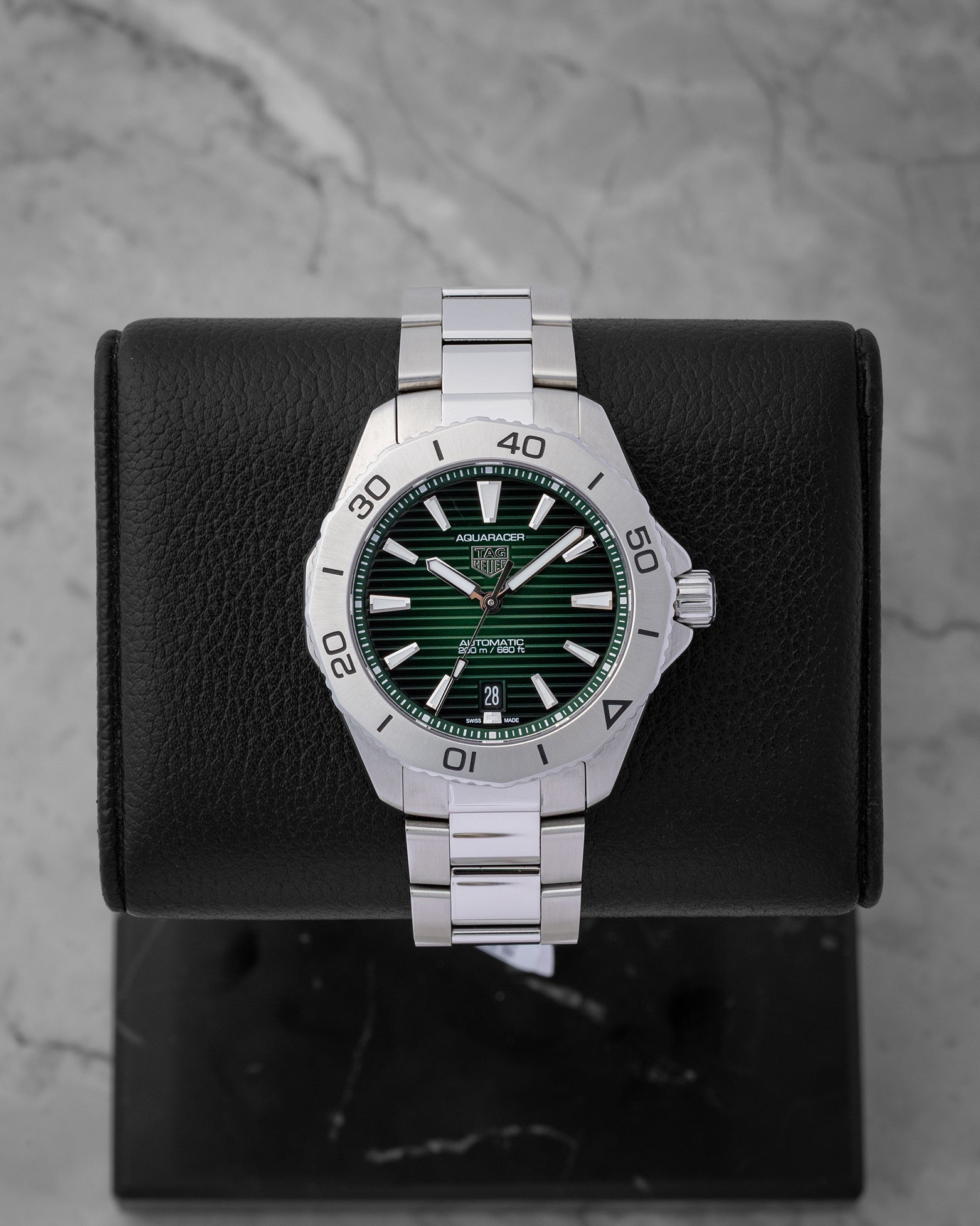 Preowned TAG Heuer Aquaracer Professional 200 Date WBP2115.BA0627 luxury watch featuring a textured horizontal liner green dial at Noah's Fine Watches and Jewelry in Dallas