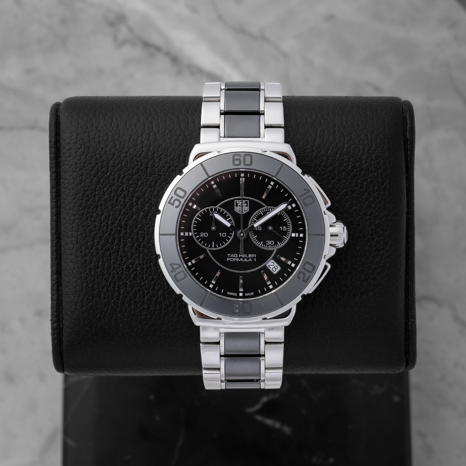 Preowned TAG Heuer Formula 1 CAH1210.BA0862 racing chronograph watch with high-gloss black ceramic bezel and dial at Noah's Fine Watches and Jewelry in Dallas