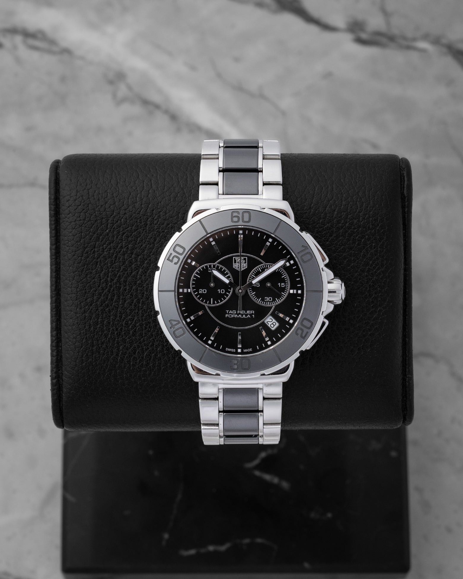 Preowned TAG Heuer Formula 1 CAH1210.BA0862 racing chronograph watch with high-gloss black ceramic bezel and dial at Noah's Fine Watches and Jewelry in Dallas