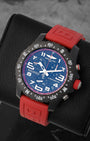 angled view of the Breitling Endurance Pro sports watch showcasing the black chronograph dial, pulse scale inner ring, and prominent white Arabic numerals