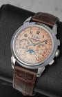 Right three-quarter angled perspective of the Patek Philippe 5270P-001 showcasing the moon phase indicator, leap year window, and brown alligator leather strap