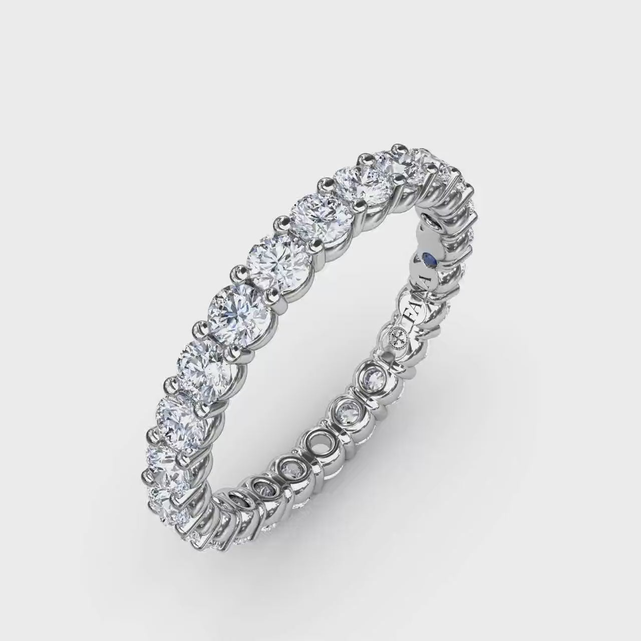 360 degree product video of the Fana W6127 14k white gold 1.44ct shared prong diamond eternity band, highlighting its premium low-profile setting and fluid loop of light at Noah's Fine Watches & Jewelry
